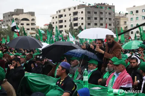 Palestinian Hamas supporters attend a Hamas rally marking the 25th anniversary of the Islamist movement's founding in Gaza City on December 8, 2012. Hamas chief Khaled Meshaal arrived to Gaza strip on December 7 during h...