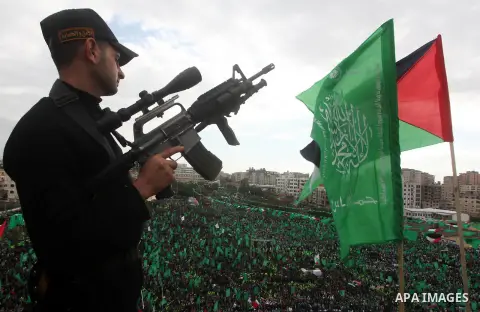 Palestinian Hamas supporters attend a Hamas rally marking the 25th anniversary of the Islamist movement's founding in Gaza City on December 8, 2012. Hamas chief Khaled Meshaal arrived to Gaza strip on December 7 during h...