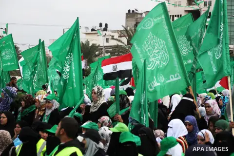 Palestinian Hamas supporters attend a Hamas rally marking the 25th anniversary of the Islamist movement's founding in Gaza City on December 8, 2012. Hamas chief Khaled Meshaal arrived to Gaza strip on December 7 during h...