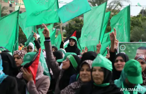 Palestinian Hamas supporters attend a Hamas rally marking the 25th anniversary of the Islamist movement's founding in Gaza City on December 8, 2012. Hamas chief Khaled Meshaal arrived to Gaza strip on December 7 during h...