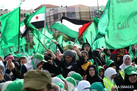 Palestinian Hamas supporters attend a Hamas rally marking the 25th anniversary of the Islamist movement's founding in Gaza City on December 8, 2012. Hamas chief Khaled Meshaal arrived to Gaza strip on December 7 during h...