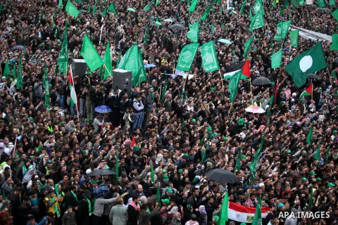 Palestinian Hamas supporters attend a Hamas rally marking the 25th anniversary of the Islamist movement's founding in Gaza City on December 8, 2012. Hamas chief Khaled Meshaal arrived to Gaza strip on December 7 during h...