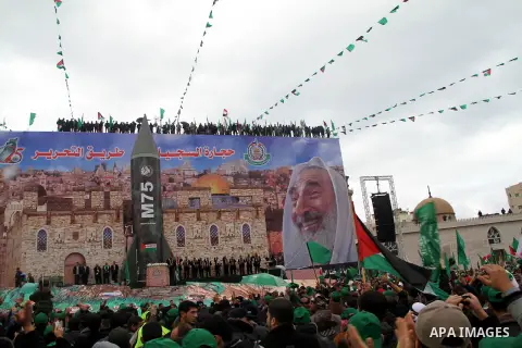 Palestinian Hamas supporters attend a Hamas rally marking the 25th anniversary of the Islamist movement's founding in Gaza City on December 8, 2012. Hamas chief Khaled Meshaal arrived to Gaza strip on December 7 during h...