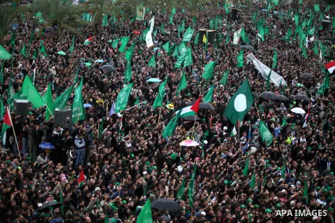 Palestinian Hamas supporters attend a Hamas rally marking the 25th anniversary of the Islamist movement's founding in Gaza City on December 8, 2012. Hamas chief Khaled Meshaal arrived to Gaza strip on December 7 during h...