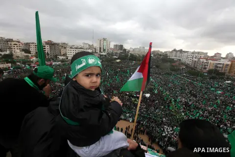 Palestinian Hamas supporters attend a Hamas rally marking the 25th anniversary of the Islamist movement's founding in Gaza City on December 8, 2012. Hamas chief Khaled Meshaal arrived to Gaza strip on December 7 during h...