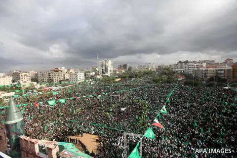 Palestinian Hamas supporters attend a Hamas rally marking the 25th anniversary of the Islamist movement's founding in Gaza City on December 8, 2012. Hamas chief Khaled Meshaal arrived to Gaza strip on December 7 during h...