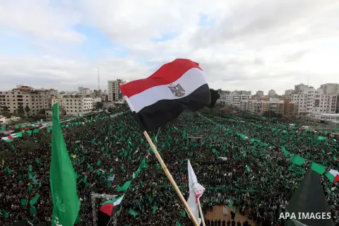 Palestinian Hamas supporters attend a Hamas rally marking the 25th anniversary of the Islamist movement's founding in Gaza City on December 8, 2012. Hamas chief Khaled Meshaal arrived to Gaza strip on December 7 during h...
