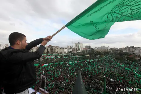 Palestinian Hamas supporters attend a Hamas rally marking the 25th anniversary of the Islamist movement's founding in Gaza City on December 8, 2012. Hamas chief Khaled Meshaal arrived to Gaza strip on December 7 during h...