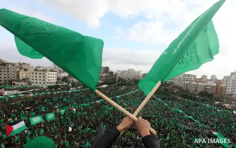 Palestinian Hamas supporters attend a Hamas rally marking the 25th anniversary of the Islamist movement's founding in Gaza City on December 8, 2012. Hamas chief Khaled Meshaal arrived to Gaza strip on December 7 during h...