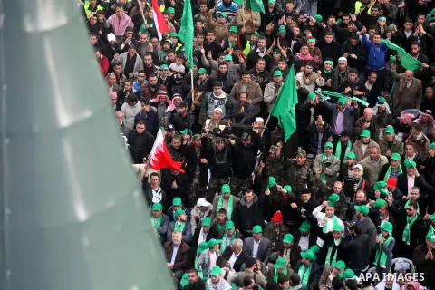 Palestinian Hamas supporters attend a Hamas rally marking the 25th anniversary of the Islamist movement's founding in Gaza City on December 8, 2012. Hamas chief Khaled Meshaal arrived to Gaza strip on December 7 during h...