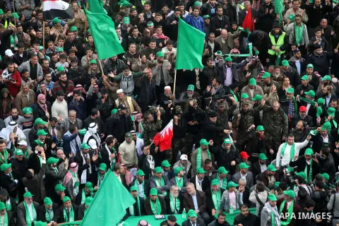 Palestinian Hamas supporters attend a Hamas rally marking the 25th anniversary of the Islamist movement's founding in Gaza City on December 8, 2012. Hamas chief Khaled Meshaal arrived to Gaza strip on December 7 during h...