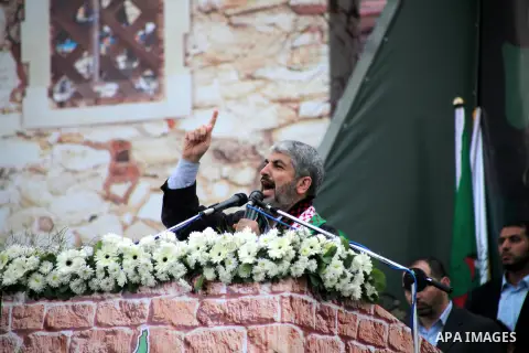 Hamas chief Khaled Meshaal speaks during a Hamas rally marking the 25th anniversary of the Islamist movement's founding in Gaza City on December 8, 2012. Meshaal arrived to Gaza strip on December 7 during his first-ever...