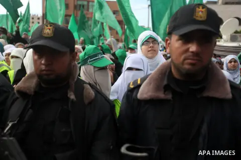 Palestinian Hamas supporters attend a Hamas rally marking the 25th anniversary of the Islamist movement's founding in Gaza City on December 8, 2012. Hamas chief Khaled Meshaal arrived to Gaza strip on December 7 during h...