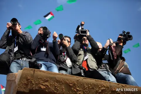 Palestinian Hamas supporters attend a Hamas rally marking the 25th anniversary of the Islamist movement's founding in Gaza City on December 8, 2012. Hamas chief Khaled Meshaal arrived to Gaza strip on December 7 during h...