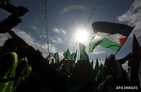 Palestinian Hamas supporters attend a Hamas rally marking the 25th anniversary of the Islamist movement's founding in Gaza City on December 8, 2012. Hamas chief Khaled Meshaal arrived to Gaza strip on December 7 during h...