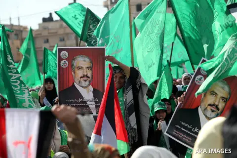 Palestinian Hamas supporters attend a Hamas rally marking the 25th anniversary of the Islamist movement's founding in Gaza City on December 8, 2012. Hamas chief Khaled Meshaal arrived to Gaza strip on December 7 during h...