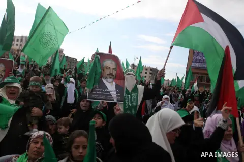 Palestinian Hamas supporters attend a Hamas rally marking the 25th anniversary of the Islamist movement's founding in Gaza City on December 8, 2012. Hamas chief Khaled Meshaal arrived to Gaza strip on December 7 during h...