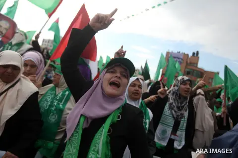 Palestinian Hamas supporters attend a Hamas rally marking the 25th anniversary of the Islamist movement's founding in Gaza City on December 8, 2012. Hamas chief Khaled Meshaal arrived to Gaza strip on December 7 during h...