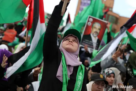 Palestinian Hamas supporters attend a Hamas rally marking the 25th anniversary of the Islamist movement's founding in Gaza City on December 8, 2012. Hamas chief Khaled Meshaal arrived to Gaza strip on December 7 during h...