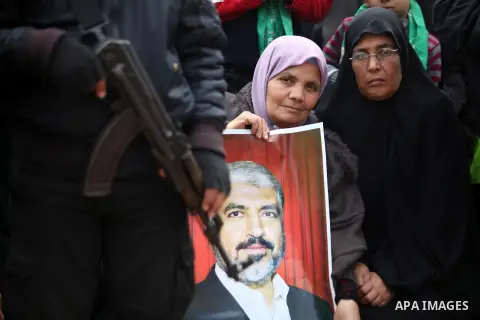 Palestinian Hamas supporters attend a Hamas rally marking the 25th anniversary of the Islamist movement's founding in Gaza City on December 8, 2012. Hamas chief Khaled Meshaal arrived to Gaza strip on December 7 during h...