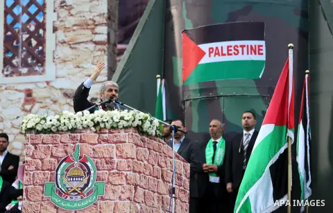 Hamas chief Khaled Meshaal speaks during a Hamas rally marking the 25th anniversary of the Islamist movement's founding in Gaza City on December 8, 2012. Meshaal arrived to Gaza strip on December 7 during his first-ever...