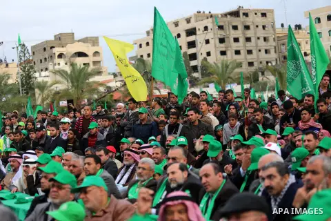 Palestinian Hamas supporters attend a Hamas rally marking the 25th anniversary of the Islamist movement's founding in Gaza City on December 8, 2012. Hamas chief Khaled Meshaal arrived to Gaza strip on December 7 during h...