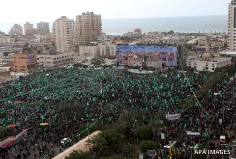 Palestinian Hamas supporters attend a Hamas rally marking the 25th anniversary of the Islamist movement's founding in Gaza City on December 8, 2012. Hamas chief Khaled Meshaal arrived to Gaza strip on December 7 during h...