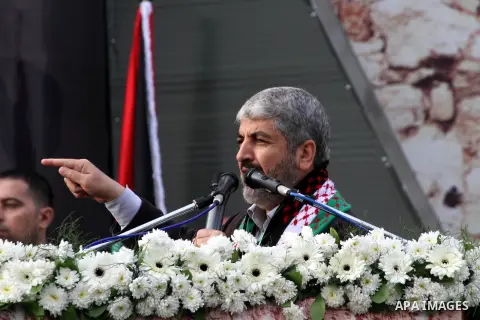 Hamas chief Khaled Meshaal speaks during a Hamas rally marking the 25th anniversary of the Islamist movement's founding in Gaza City on December 8, 2012. Meshaal arrived to Gaza strip on December 7 during his first-ever...