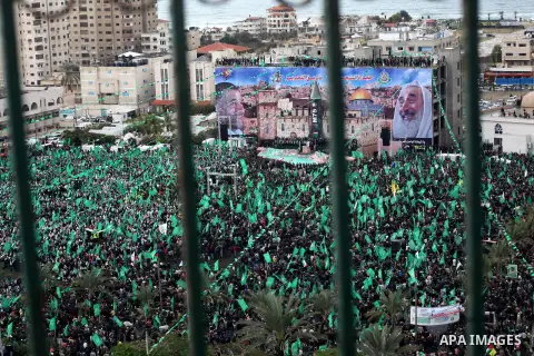 Palestinian Hamas supporters attend a Hamas rally marking the 25th anniversary of the Islamist movement's founding in Gaza City on December 8, 2012. Hamas chief Khaled Meshaal arrived to Gaza strip on December 7 during h...