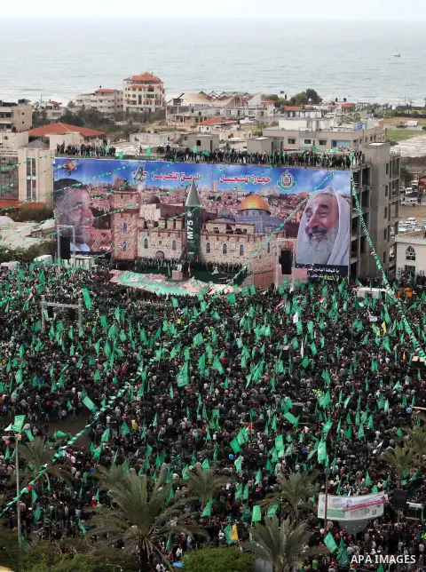 Palestinian Hamas supporters attend a Hamas rally marking the 25th anniversary of the Islamist movement's founding in Gaza City on December 8, 2012. Hamas chief Khaled Meshaal arrived to Gaza strip on December 7 during h...