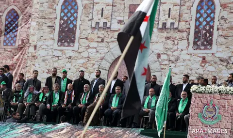Hamas chief Khaled Meshaal, with senior Hamas leaders, takes part in a Hamas rally marking the 25th anniversary of the Islamist movement's founding in Gaza City on December 8, 2012. Meshaal arrived to Gaza strip on Decem...
