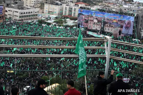 Palestinian Hamas supporters attend a Hamas rally marking the 25th anniversary of the Islamist movement's founding in Gaza City on December 8, 2012. Hamas chief Khaled Meshaal arrived to Gaza strip on December 7 during h...