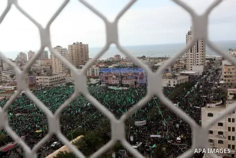 Palestinian Hamas supporters attend a Hamas rally marking the 25th anniversary of the Islamist movement's founding in Gaza City on December 8, 2012. Hamas chief Khaled Meshaal arrived to Gaza strip on December 7 during h...