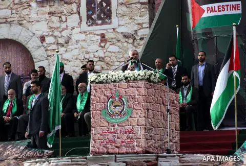 Palestinian prime minister in Gaza Strip, Ismail Haniyah speaks during a Hamas rally marking the 25th anniversary of the Islamist movement's founding in Gaza City on December 8, 2012. Meshaal arrived to Gaza strip on Dec...