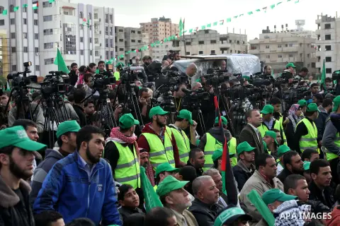 Palestinian Hamas supporters attend a Hamas rally marking the 25th anniversary of the Islamist movement's founding in Gaza City on December 8, 2012. Hamas chief Khaled Meshaal arrived to Gaza strip on December 7 during h...