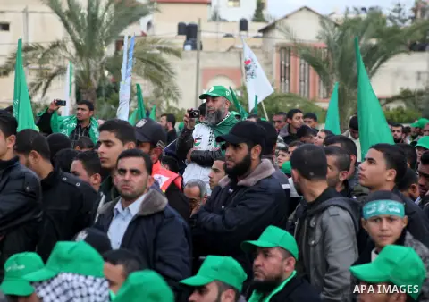 Palestinian Hamas supporters attend a Hamas rally marking the 25th anniversary of the Islamist movement's founding in Gaza City on December 8, 2012. Hamas chief Khaled Meshaal arrived to Gaza strip on December 7 during h...