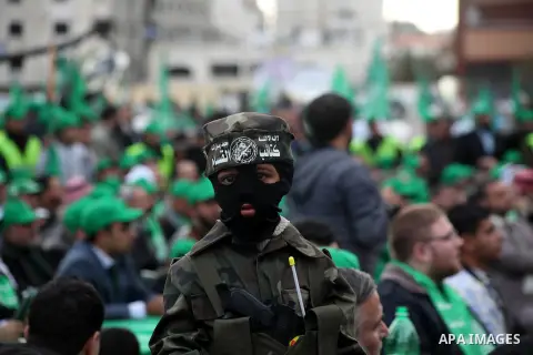 Palestinian Hamas supporters attend a Hamas rally marking the 25th anniversary of the Islamist movement's founding in Gaza City on December 8, 2012. Hamas chief Khaled Meshaal arrived to Gaza strip on December 7 during h...