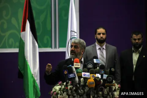 Hamas chief in exile Khaled Meshaal,speaks during a visit to the Islamic University in Gaza City on December 9, 2012. Meshaal rejected ceding "an inch" of Palestinian territory to Israel or recognising the Jewish state,...