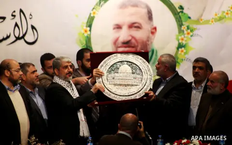 Hamas chief Khaled Meshaal attends a ceremony with Greek Orthodox Archbishop Alexios and senior Muslim cleric Hassan Al-Jojo in Gaza City December 9, 2012. Meshaal, in a defiant speech during his first ever visit to Gaza...