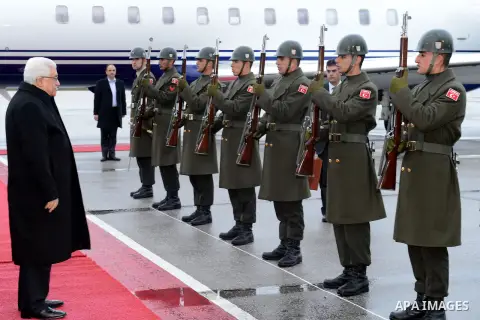 Palestinian President Mahmoud Abbas reviews honor guards upon his arrival to Ankara during an official visit to Turkey on December 10, 2012. Photo by Thaer Ganaim