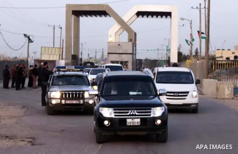 Hamas leader in exile Khaled Meshaal and Palestinian Prime Minister in the Gaza Strip Ismail Haniya ride their car to the Rafah crossing border, upon Meshaal departure from the Gaza Strip on December 10, 2012 in Gaza. Ex...