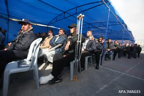 Members of the Palestinian police in Gaza participate in a ceremony honoring the killed and wounded of the Palestinian police in Gaza City, on Dec. 11, 2012. Photo by Majdi Fathi