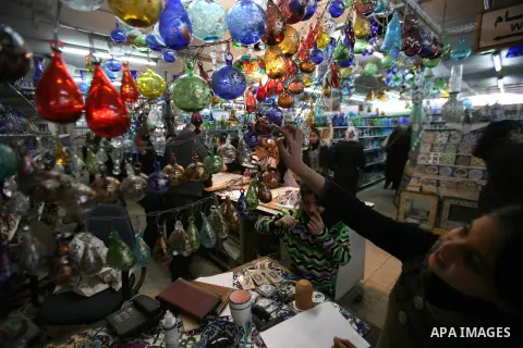 Palestinians buy a different types of glasses in AL-SALAM factory in the West Bank city of Hebron December 12, 2012. Glass has been a traditional industry in Hebron for over 600 years but as a result of the increased vio...
