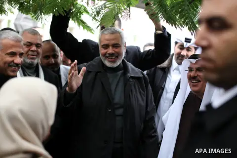 Palestinian Prime Minister Ismail Haniyeh and Qatari ambassador Mohammed al-Imadi visit bombed area during the launching ceremony of Qatari grant projects in Gaza city on 13 Dec, 2012. The emir of Qatar Sheikh Hamad bin...