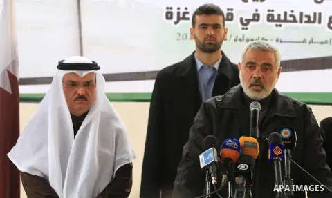 Palestinian Prime Minister Ismail Haniyeh speaks during the launching ceremony of Qatari grant projects in Gaza city on 13 Dec, 2012. The emir of Qatar Sheikh Hamad bin Khalifa Al Thani announced an increase in Qatar's g...