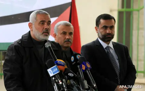 Palestinian Prime Minister Ismail Haniyeh speaks during the launching ceremony of Qatari grant projects in Gaza city on 13 Dec, 2012. The emir of Qatar Sheikh Hamad bin Khalifa Al Thani announced an increase in Qatar's g...
