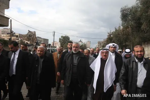 Palestinian Prime Minister Ismail Haniyeh and Qatari ambassador Mohammed al-Imadi visit bombed area during the launching ceremony of Qatari grant projects in Gaza city on 13 Dec, 2012. The emir of Qatar Sheikh Hamad bin...