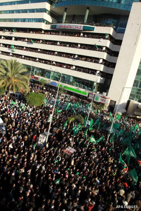 Palestinian Hamas supporters attend a Hamas rally marking the 25th anniversary of the Islamist movement's founding in the West Bank city of Nablus on December 13, 2012. Rapprochement between rival Palestinian factions Ha...