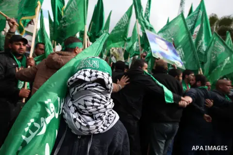 Palestinian supporters of Hamas attend a rally marking the 25th anniversary of the Islamist movement's foundation in the West bank city of Ramallah, 14 December 2012. Hamas held its first rally in the West Bank on 13 Dec...