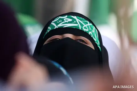 Palestinian supporters of Hamas attend a rally marking the 25th anniversary of the Islamist movement's foundation in the West bank city of Ramallah, 14 December 2012. Hamas held its first rally in the West Bank on 13 Dec...